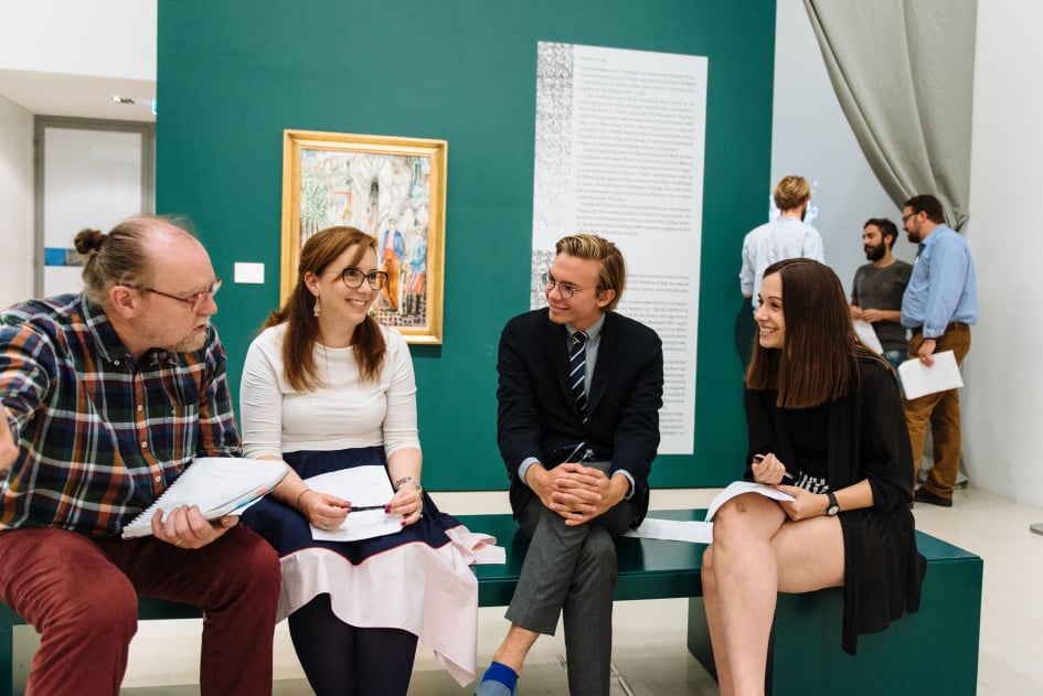 Workshop participants discussing gallery strategy