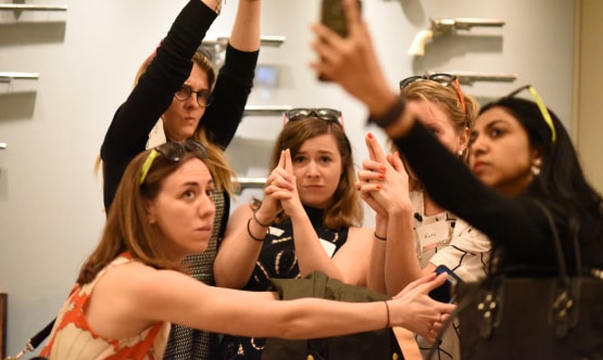 Five women taking a selfie during a tour activity.