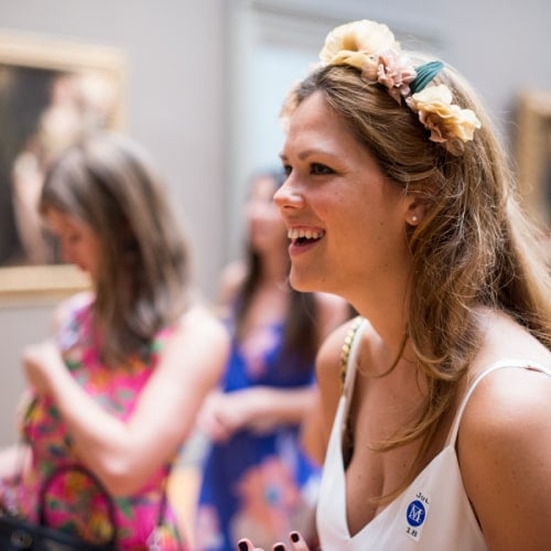 Female guest on a bachelorette tour smiling.?></noscript>