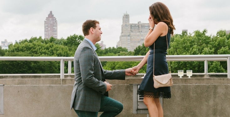A guy popping the question on a private tour. 