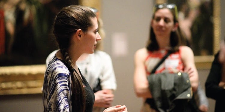 Renegade Guide, Anna, leading an empowering tour a the museum.